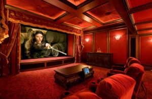 Grand-and-Vivacious-Home-Theater-Room-clad-in-Velvet-Scralet
