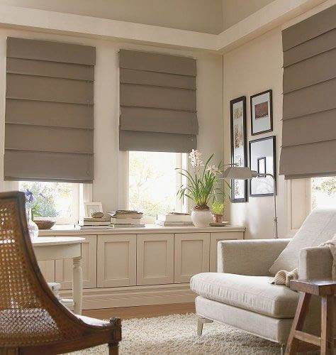 Hobbled roman shades have more structure, retain the horizontal element even when they're down. It's a choice.:
