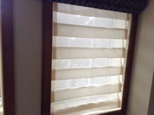 Sheer roman shades are the perfect combination of privacy and soft views.