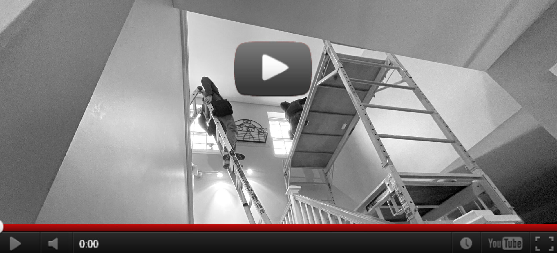 Installation Techs on scaffolding in home